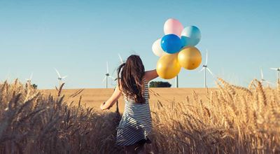 Girl with balloon illustrating Expancel microspheres - light weight fillers and blowing agents in one.