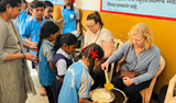 Mid day meal distribution at a local school