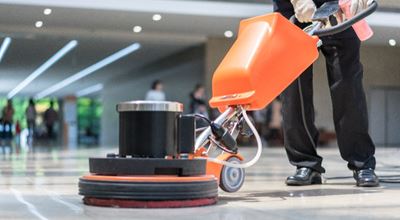 Floor care machine cleaning institutional building.  