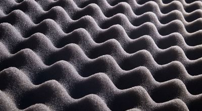 A piece of black ribbed foam rubber