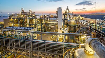 Production factory at sunset