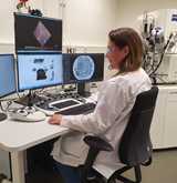 Researcher working in a microscopy application area—highlighting ECCD’s analytical capabilities.