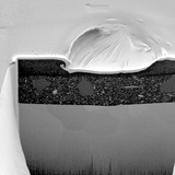 Crater image from focused ion beam (FIB) analysis—used in materials science research.