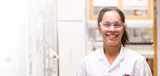 A Nouryon employee in a labcoat