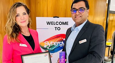 Sirpa Engman and Pratik Dabhekar with the award