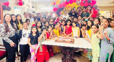 Birthday celebration with Nouryon team—employees gathered in a festive setting, highlighting workplace culture and team spirit.