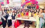 Birthday celebration with Nouryon team—employees gathered in a festive setting, highlighting workplace culture and team spirit.