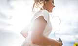 Woman running, with diabetes tracker. Meeting growing demand for peptide-based diabetes and obesity treatments