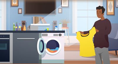 Vector image of a man doing laundry, holding a yellow shirt near a washing machine in a kitchen.